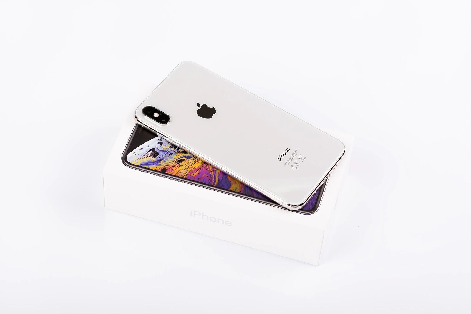 BURGAS, BULGARIA - NOVEMBER 8, 2018: Apple iPhone Xs Max Silver on white background, back view.