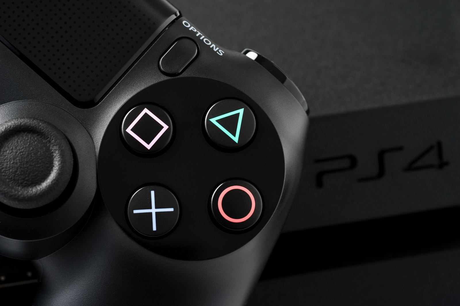 Ufa Russia - 27 February 2016: The new Sony Dualshock 4 with PlayStation 4. Sony PlayStation 4 game console of the eighth generation.