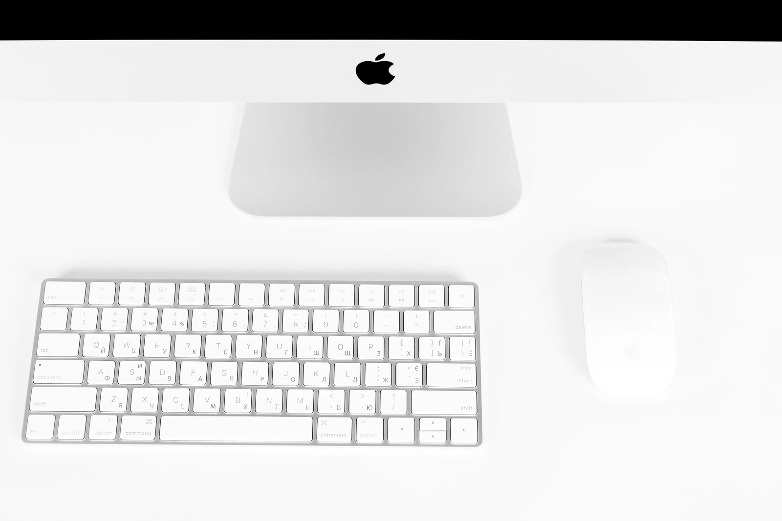 UKRAINE, RIVNE, 4 March, 2019. Apple Computer iMac 27 retina display 5K keyboard and magic mouse isolated on a white background