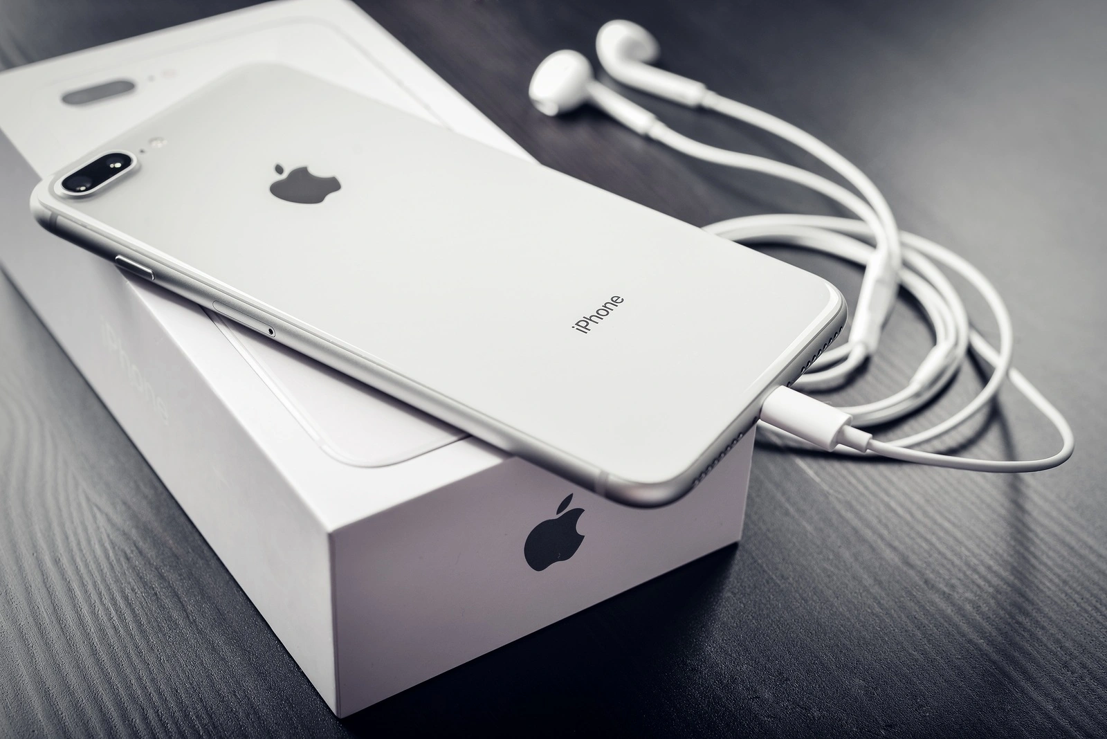 Kyiv, Ukraine - January 24, 2018: Front and back view of Apple iPhone 8 Plus Silver isolated on white background with clipping path