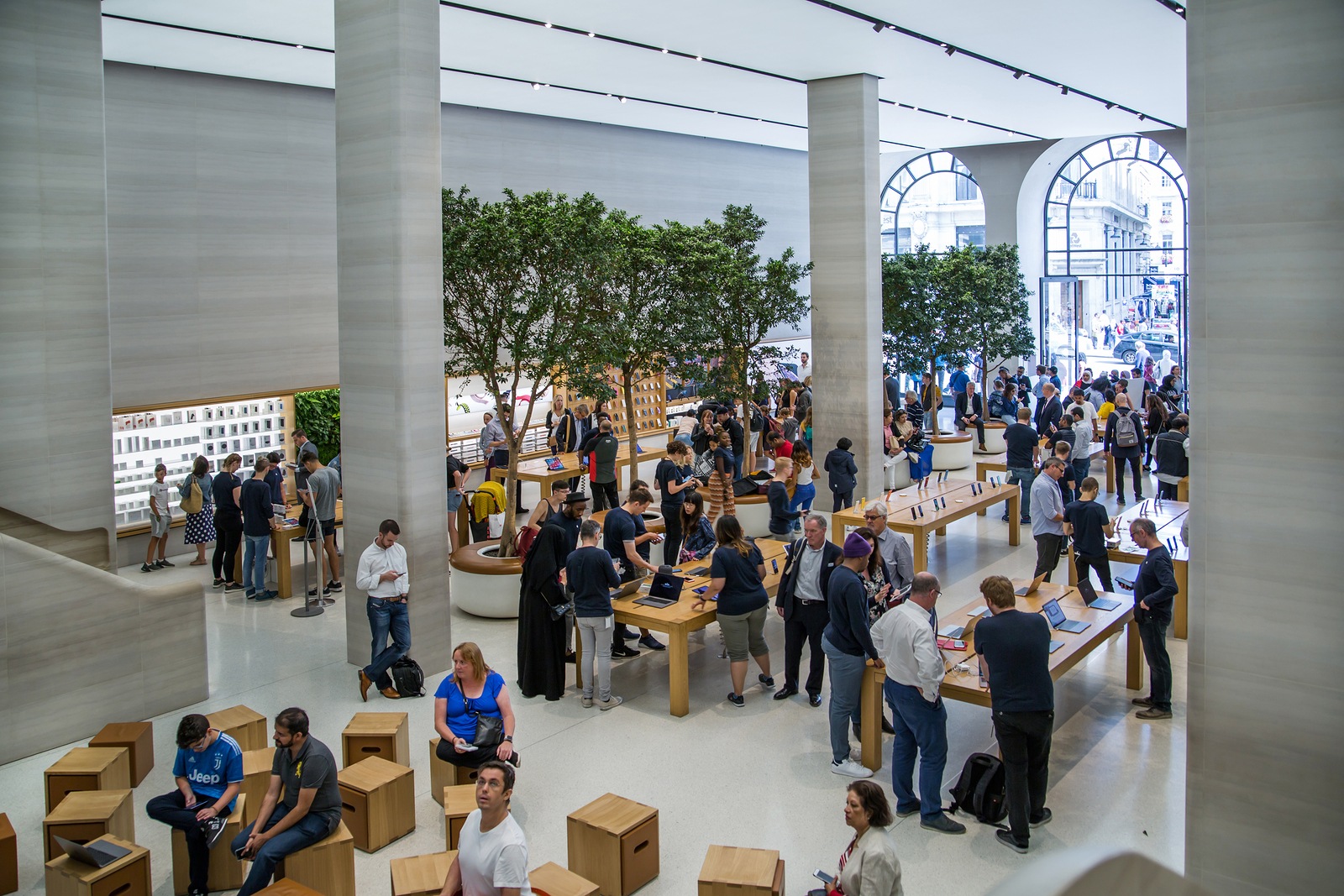 London, UK - August 13, 2019: Interior of the Apple stope. Lots of people inside the Apple Store on Regent Street, Regent Street was Apple's first store in Europe.