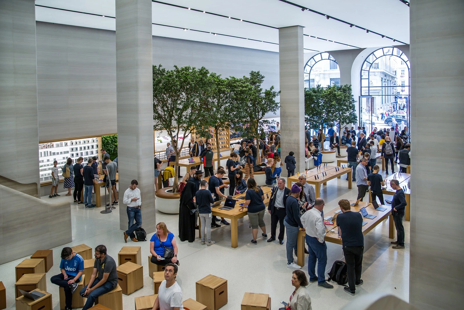 London, UK - August 13, 2019: Interior of the Apple stope. Lots of people inside the Apple Store on Regent Street, Regent Street was Apples first store in Europe.