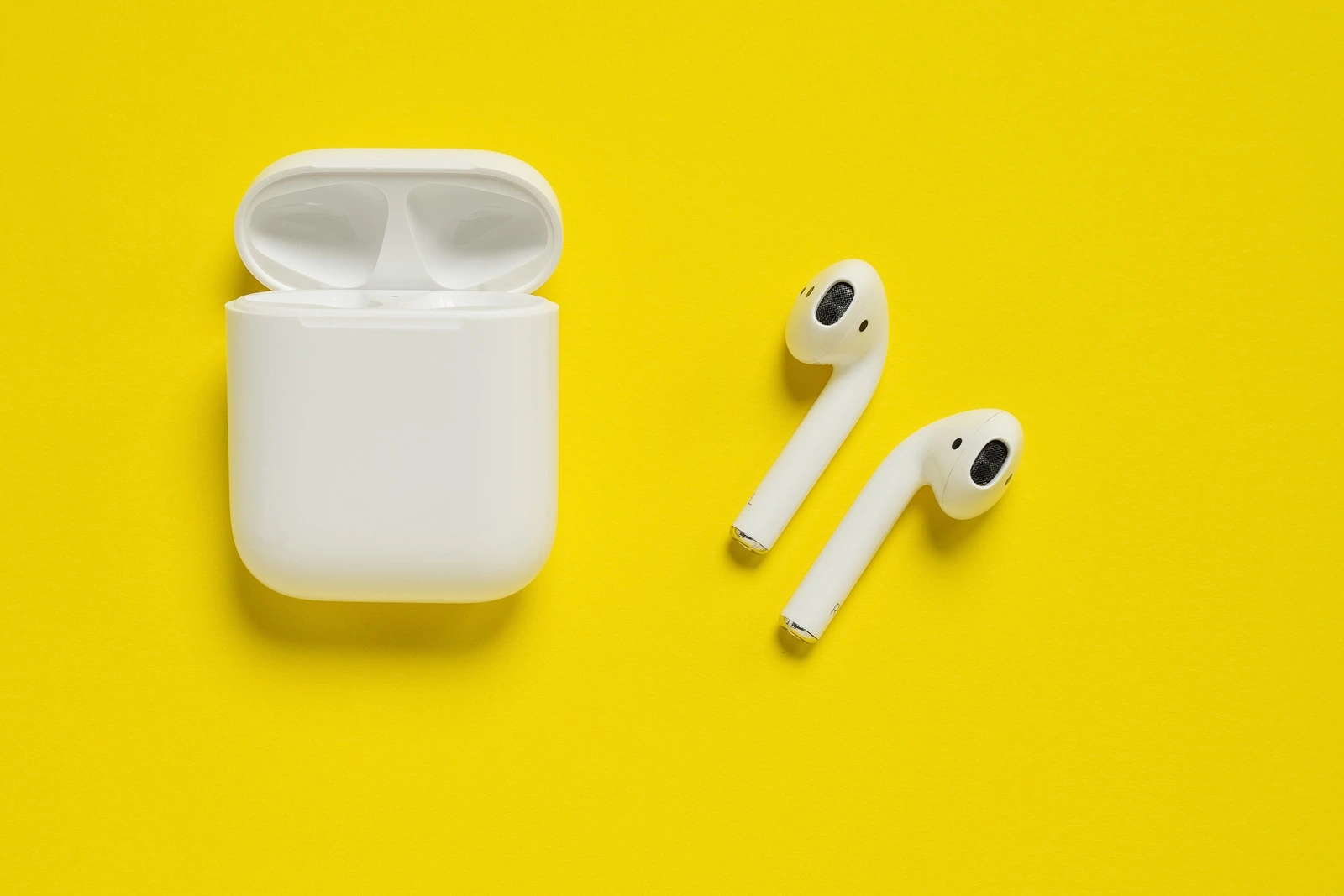 ROSTOV-ON-DON, RUSSIA - October 07, 2019: Apple AirPods wireless Bluetooth headphones and charging case for  Apple iPhone. New Apple Earpods Airpods in box.