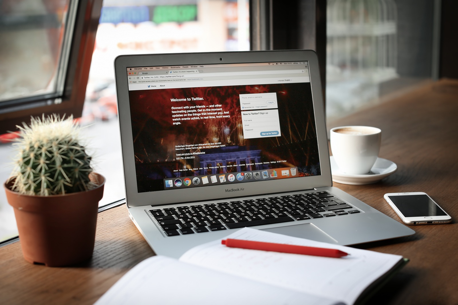 KIEV, UKRAINE - SEPTEMBER 25, 2017: Apple MacBook Air with Twitter page on screen, indoors