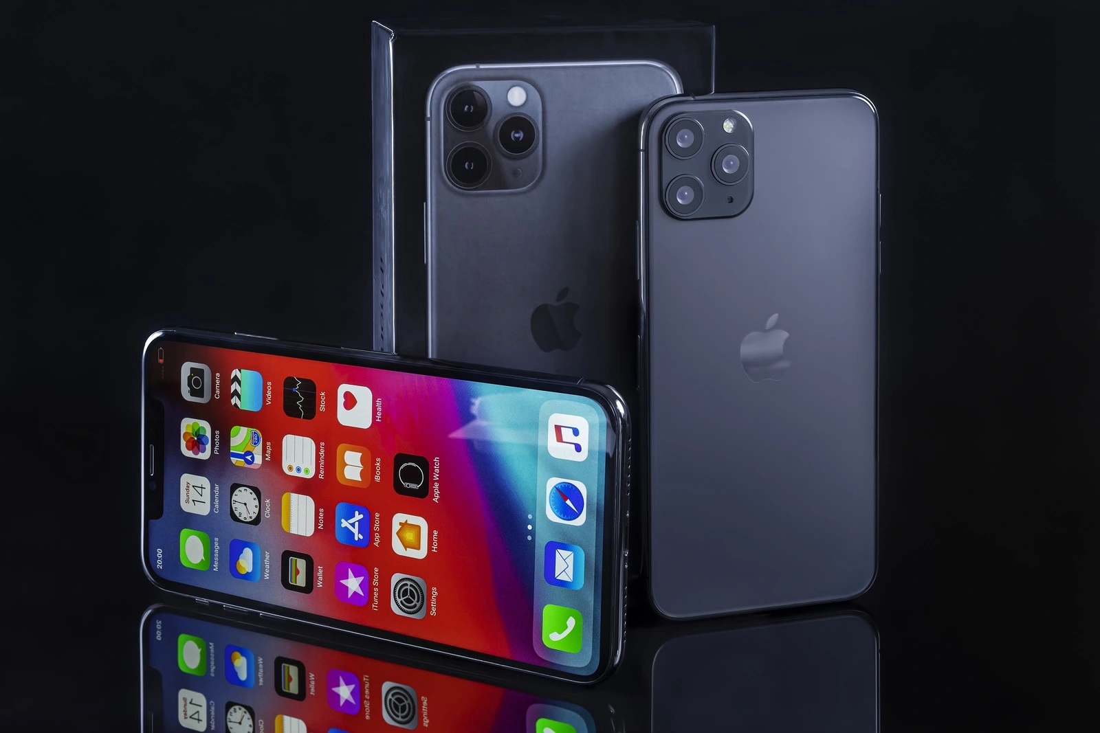 Galati, Romania - March 23, 2020: Apple launch the new smartphone iPhone 11 Pro and iPhone XS Max. iPhone Xs Max front view and iPhone 11 Pro back view on black background.
