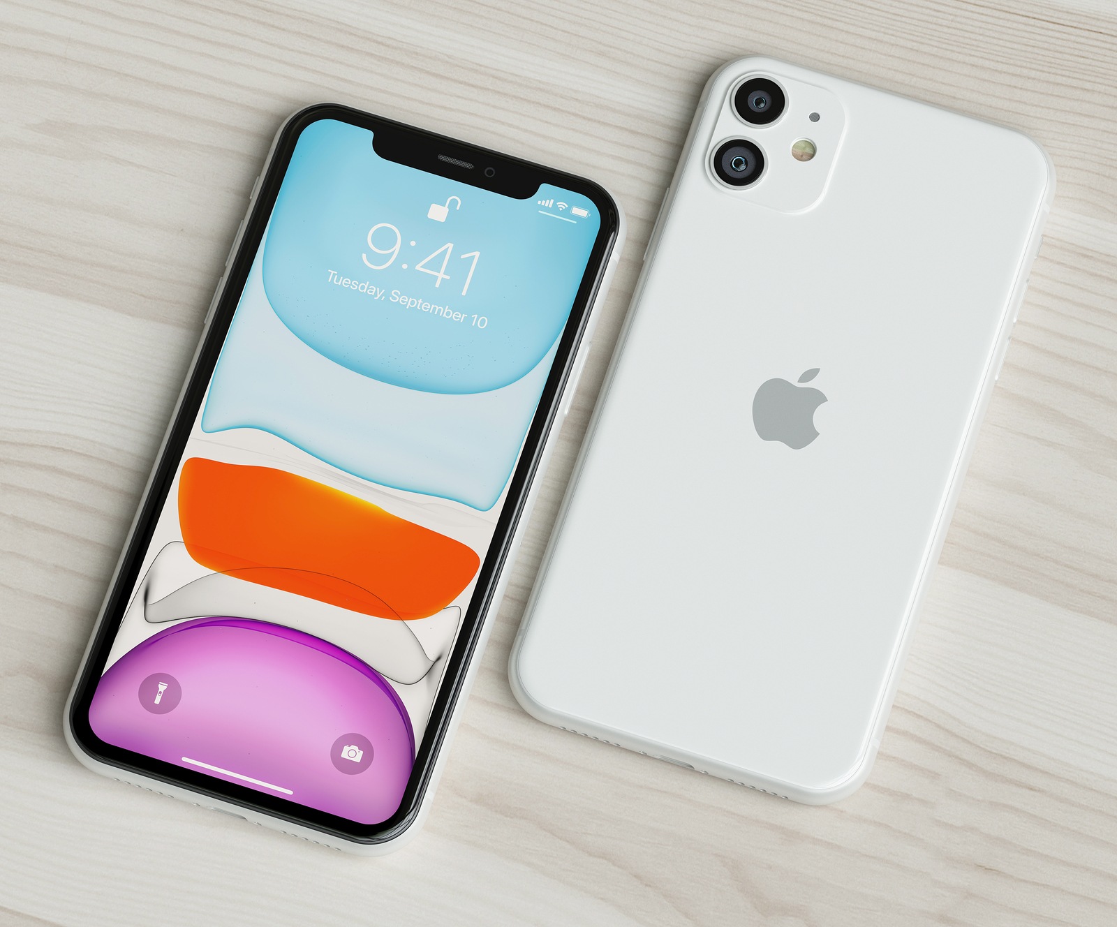 ITALY -SEPTEMBER 22, 2019: iPhone 11 smartphones on table. Iphone 11 in close up. Latest Apple Mobile iphones model. Illustrative editorial.
