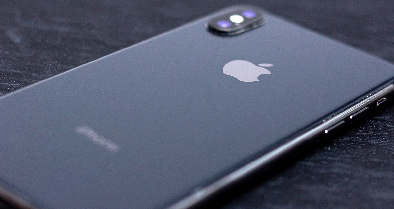 GERMANY, HAMM, 20.02.2020: Black iPhone X logo, back panel with logo.