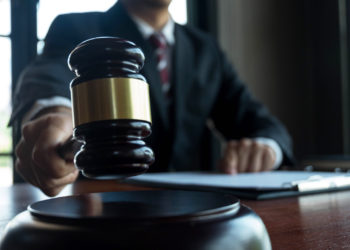 Judge with gavel on table. attorney, court judge, tribunal and justice concept.