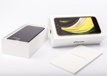 Paris, France - May 14, 2020: Packaging of the new black iPhone SE 2020 from the multinational company Apple during the days of its studio release on a white background