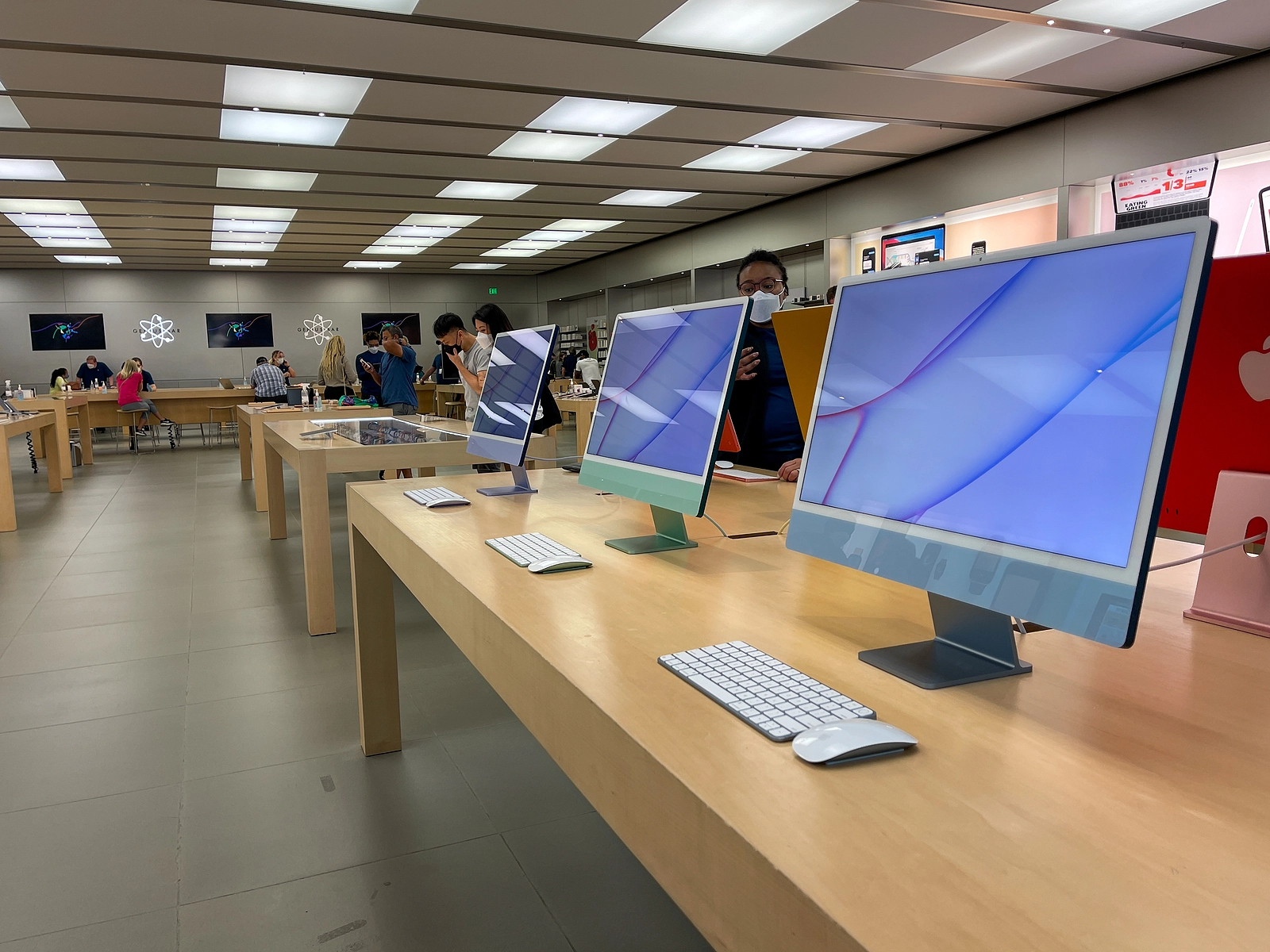 Orlando, FL USA - September 20, 2021: A row of iMac Computers at an Apple store.