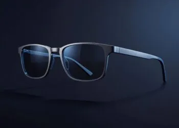 Konzeptbild einer smarten Brille mit schmalem Titanrahmen und getönten Gläsern in Dreiviertelansicht
