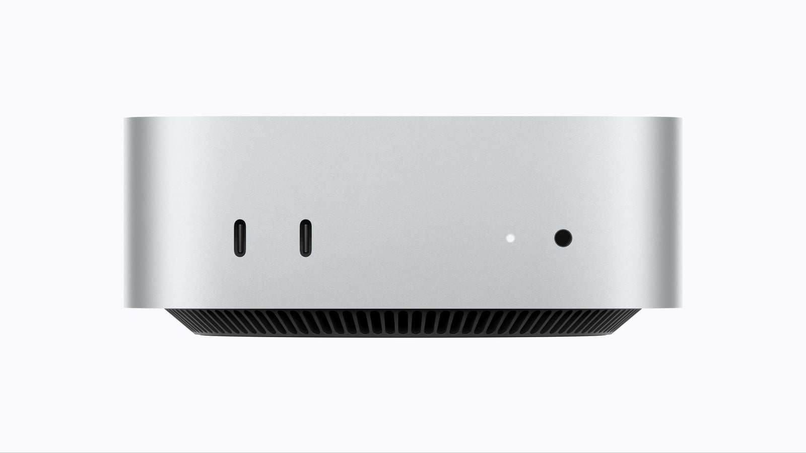 Front of the Mac mini M6 with two USB-C ports, status light and headphone jack
