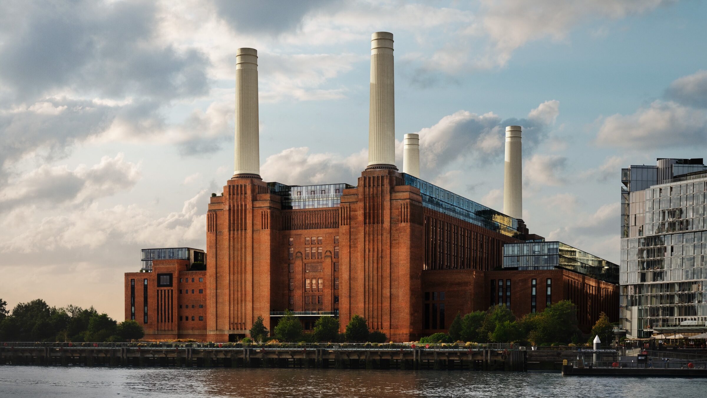 Battersea Power Station on the River Thames in London, home of Apple Music Hall, with its four white chimneys