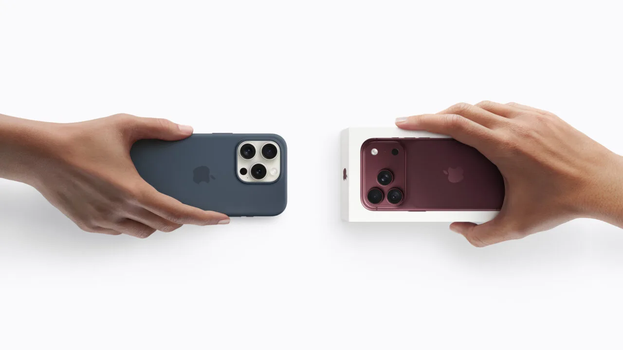 iPhone 18 Pro vorbestellen: Eine Hand reicht ein altes iPhone weiter, eine andere hält das verpackte neue Modell