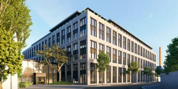 Apple 6G: Visualisierung von Apples Gebäude für das Silizium-Design-Center in München mit Glaseingang und Bäumen
