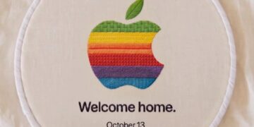 Apple-Event 13. Oktober: Gesticktes Apple-Logo in Regenbogenfarben im Stickrahmen mit dem Schriftzug „Welcome home.“ und „October 13“