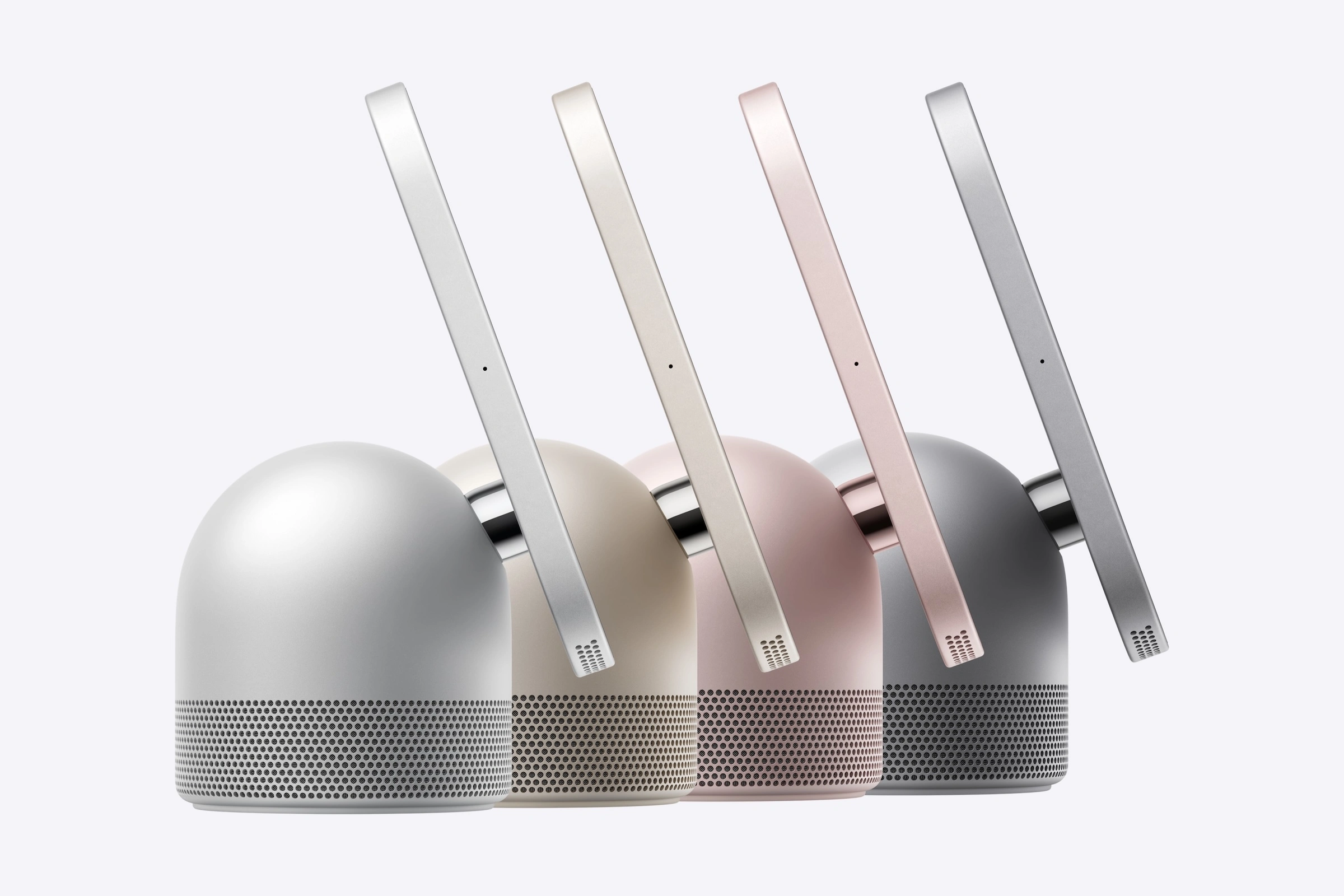 Apple HomeView in Silber, Polarstern, Rose Pink und Space Grau von der Seite, das Display hängt an einem Scharnier über dem gewölbten Lautsprecherfuß