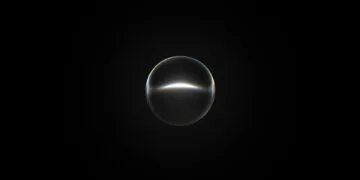 Leuchtende, gläsern wirkende Kugel auf schwarzem Hintergrund als Motiv zu Siri AI auf dem Apple TV 4K