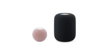 HomePod mini vs. HomePod: HomePod mini 2 in Rosa neben dem deutlich größeren HomePod 2 in Mitternacht, beide maßstabsgetreu nebeneinander