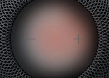 HomePod Sound Glow: Oberseite eines HomePod mit rötlich leuchtender Touch-Fläche, Plus- und Minus-Symbol und dunklem Gewebe ringsum