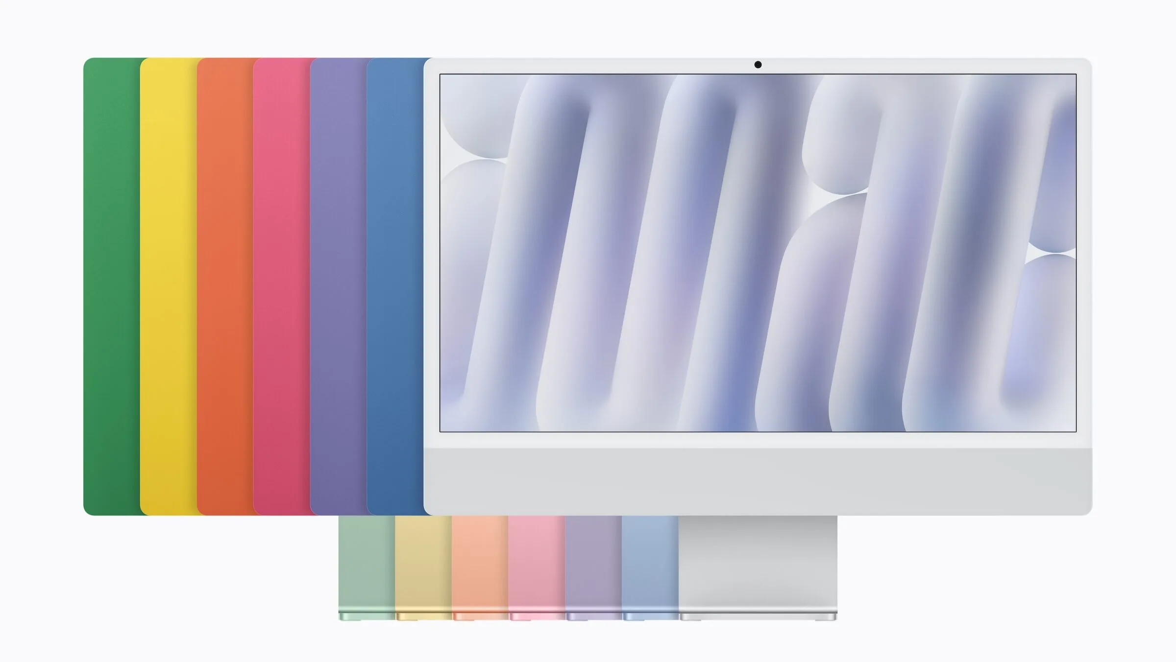 iMac M6 von vorne in Silber, dahinter die Rückseiten in Blau, Violett, Pink, Orange, Gelb und Grün