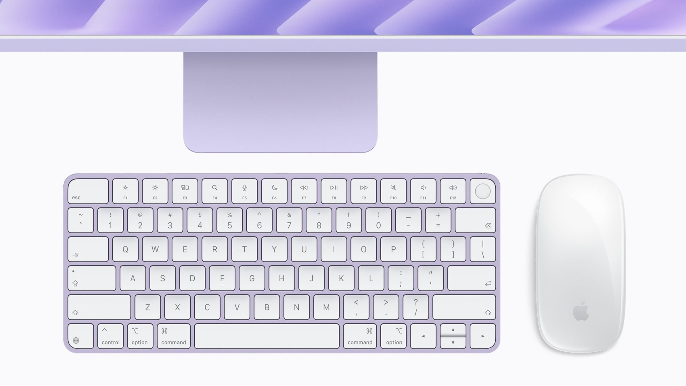 iMac vs. Mac mini: purple Magic Keyboard with Touch ID and white Magic Mouse in front of the stand of a purple iMac
