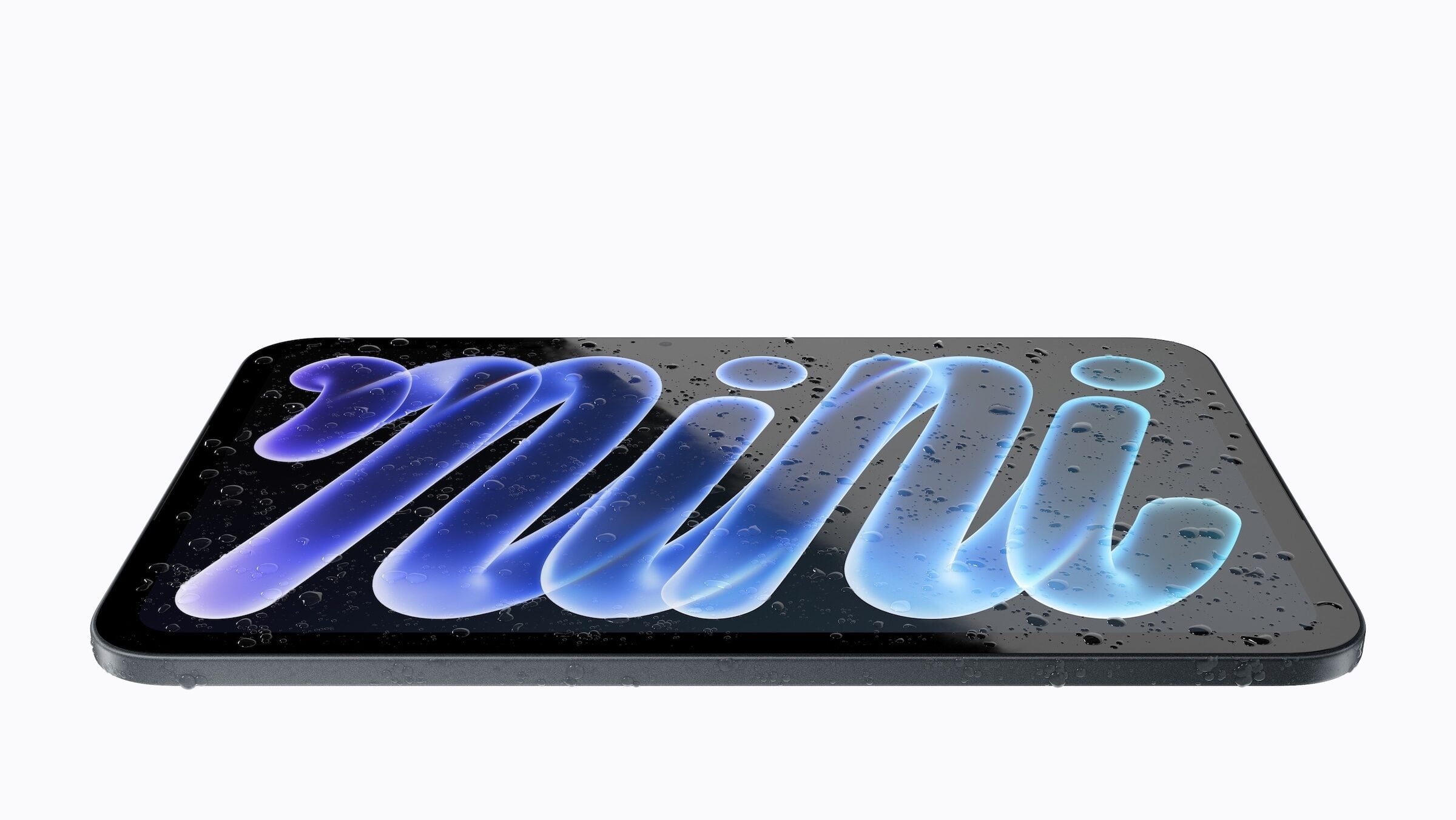The iPad mini A20 Pro lying flat with water droplets on the display and enclosure