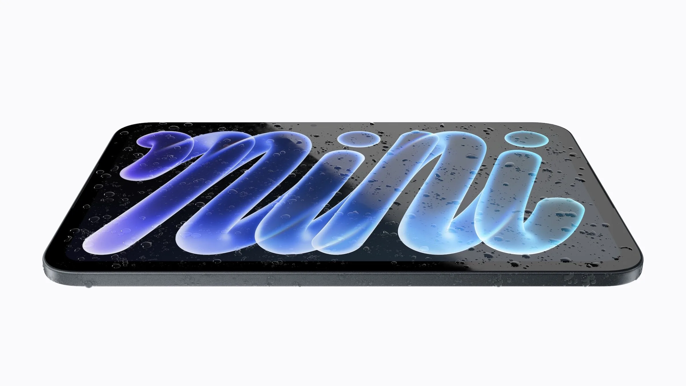 iPad mini vs. iPad Air: Das iPad mini liegt flach, auf Display und Gehäuse stehen Wassertropfen
