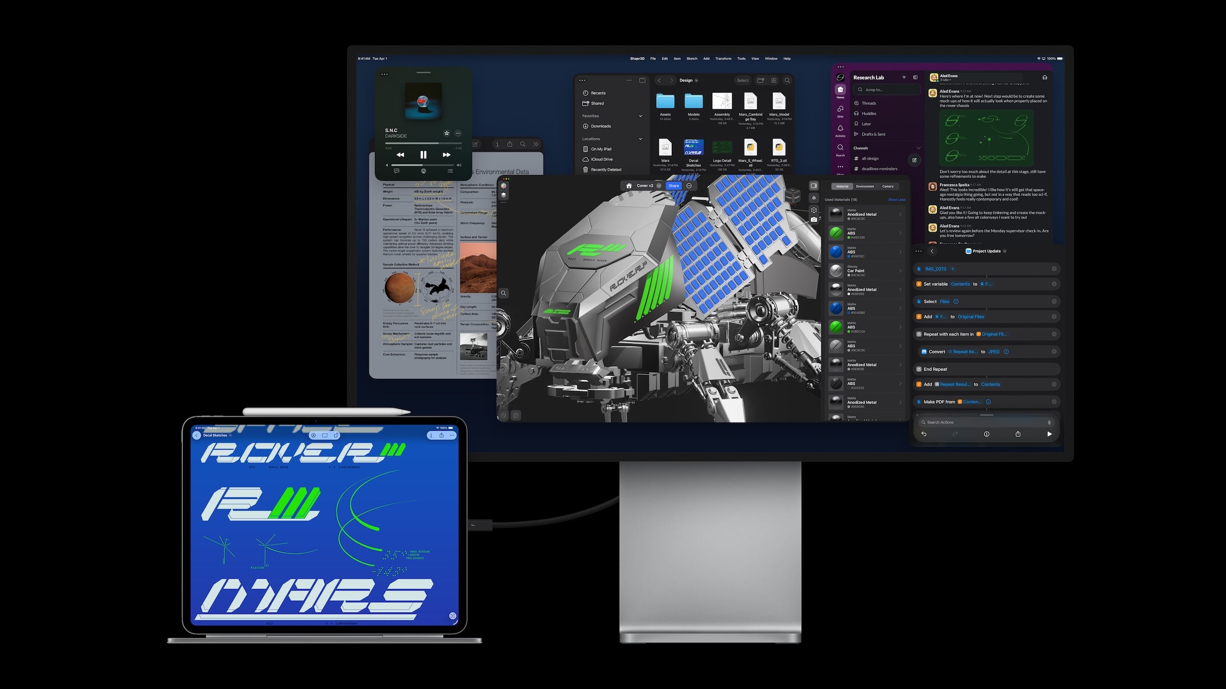 iPad Pro vs. MacBook Pro: the iPad Pro with Magic Keyboard and Apple Pencil, connected by cable to a large external display showing several app windows
