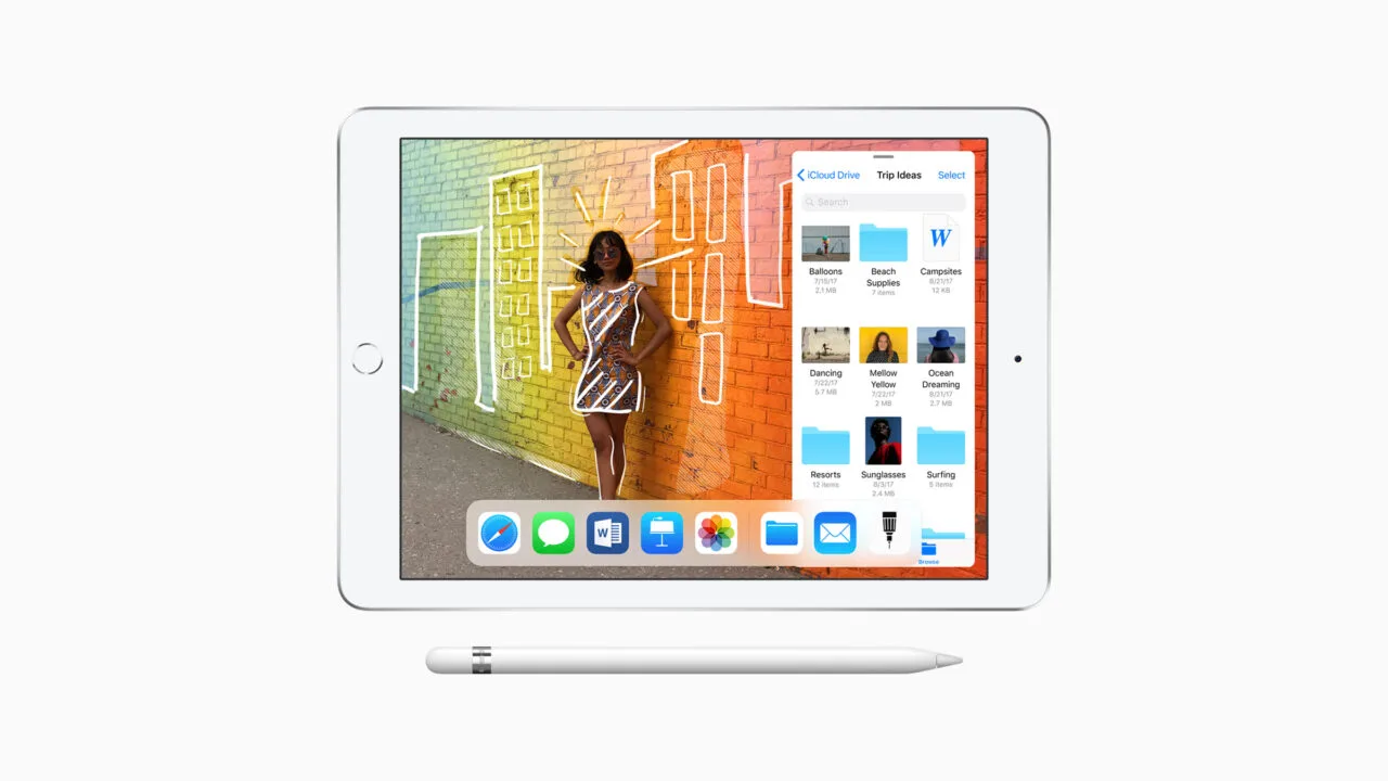 12-Zoll-MacBook veraltet: iPad der sechsten Generation in Silber mit Home-Taste, auf dem Display ein Foto mit Zeichnungen und die Dateien-App, darunter ein Apple Pencil