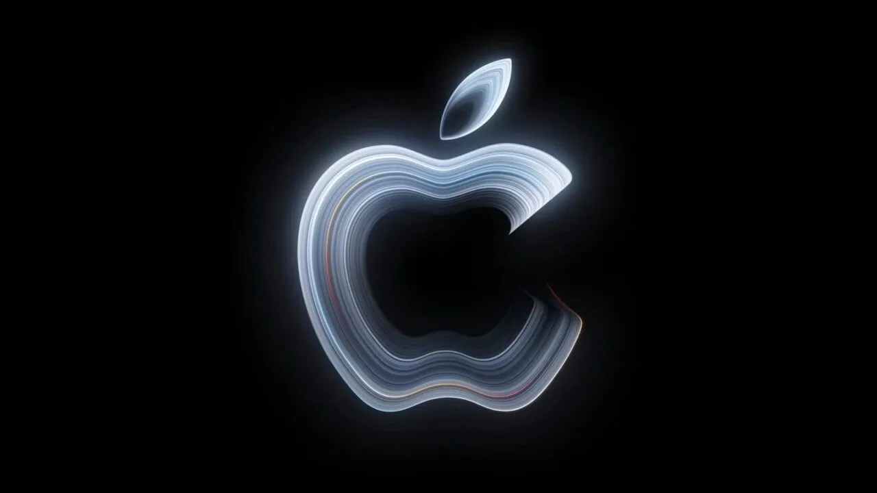 MacBook Pro Touchscreen: leuchtendes Apple-Logo aus geschwungenen Lichtlinien auf schwarzem Hintergrund