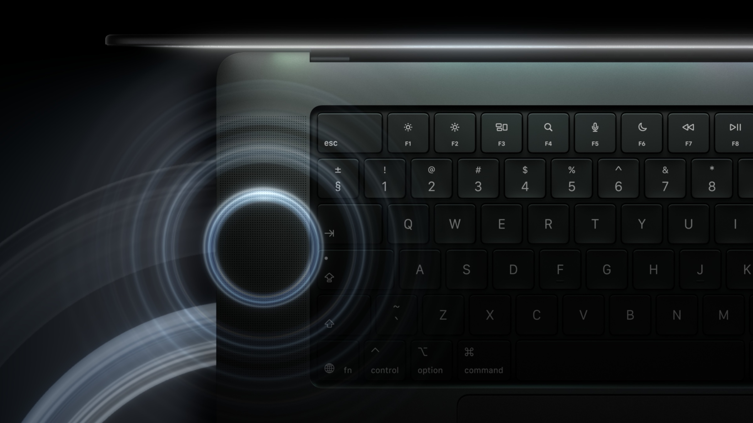 Speaker grille next to the keyboard of the MacBook Pro with PROLED XDR Display, sound waves shown as rings of light