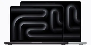 Zwei aufgeklappte MacBook Pro in Space Schwarz und Silber mit Notch am oberen Displayrand, das bisherige Design vor dem MacBook Pro Touchscreen